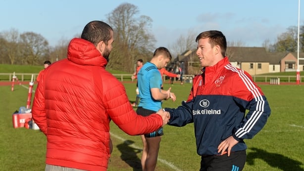 Jonny Holland exchanges a handshake with Andy Farrell in 2016 during his time as Munster temporary consultant