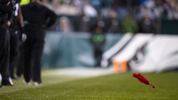 Detail view of a red challenge flag as it flies after being thrown by Head coach Doug Pederson of the Philadelphia Eagles