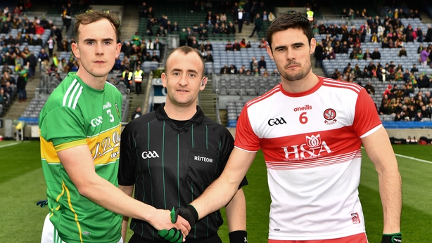Leitrim captain, Micheal McWeeney (L), and the Derry captain, Christopher McKaigue, before the Allianz Football League Division 4 Final