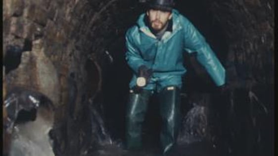 Tim Collins in a sewer on The Nature of Things (1990)