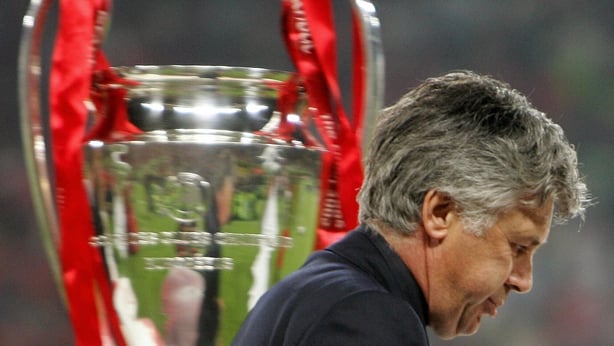  Carlo Ancelotti walks by the throphy at the end of the 2005 Champions League final against Liverpool in Istanbul