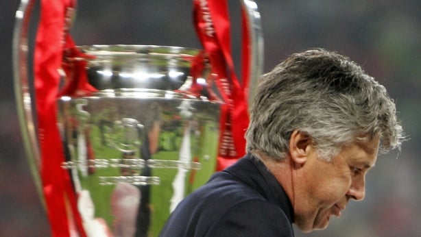 Carlo Ancelotti walks by the throphy at the end of the 2005 Champions League final against Liverpool in Istanbul