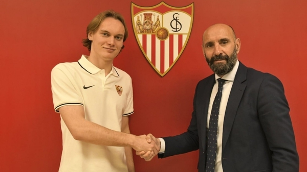 Ryan Johansson (L) with Sevilla's sporting director Monchi
