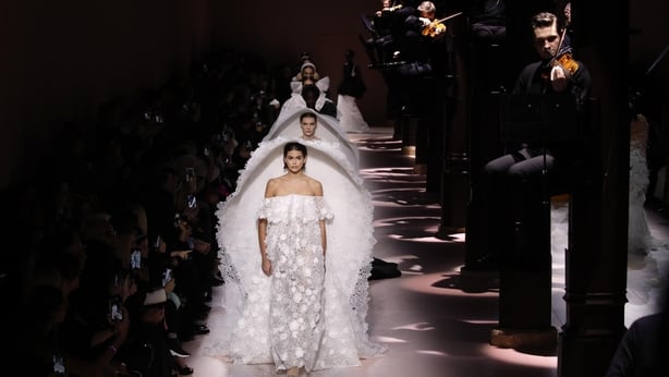Model Kaia Gerber leads other models as they wear creations for the Givenchy Haute Couture Spring/Summer 2020 fashion collection (Christophe Ena/AP)