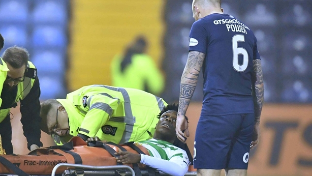 Celtics Jeremie Frimpong (left) exchanges words with Kilmarnock's Alan Power as he is replaced