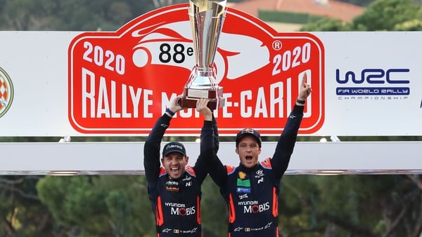 Thierry Neuville (R) and his co-pilot Nicolas Gilsoul (L) celebrate their win