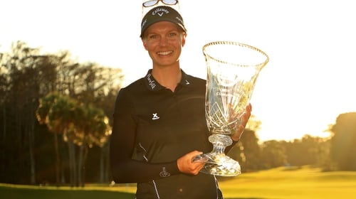 Madelene Sagstrom poses with the trophy