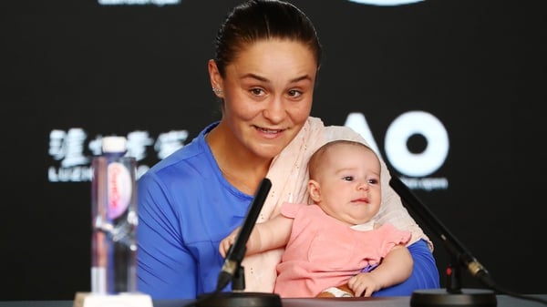 Ashleigh Barty, with her niece Olivia, faces the press after her Australian Open semi-final defeat to Sofia Kenin.