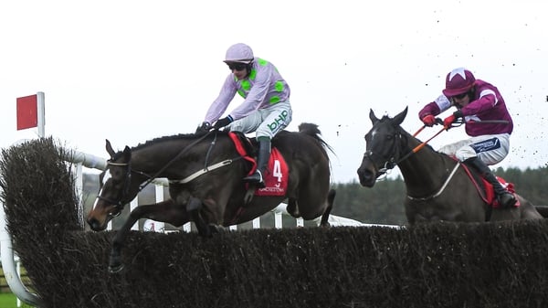 Min (L) is up against it in the Ladbrokes Dublin Chase
