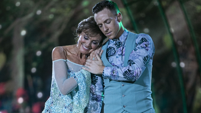 Mary smiles after putting in an elegant shift with John