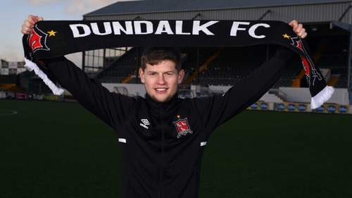 Cammy Smith poses with a Dundalk scarf