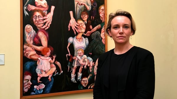 Ireland Portrayed: presenter Cristin Leach in front of Rita Duffy's Segregation (1989) at the Crawford Art Gallery in Cork