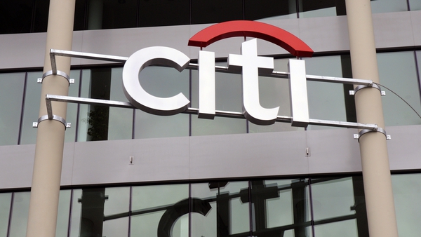 The US economic recovery has allowed Citigroup to release loan loss reserves and offset a plunge in revenue from lower trading and credit card lending