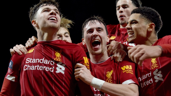 Liam Millar, Neco Williams and Ki-Jana Hoever celebrate after Liverpool took the lead