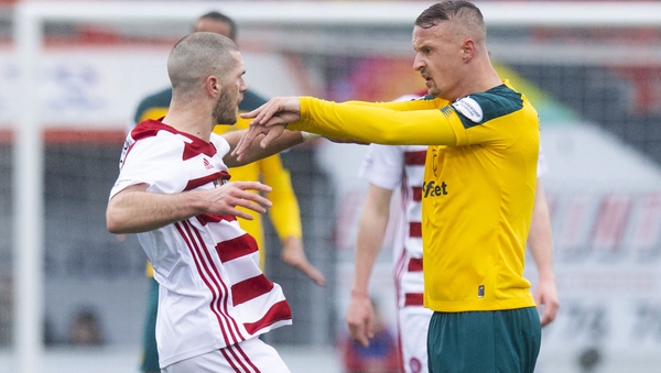 Celtic's Leigh Griffiths shoves Hamilton's Alex Gogic