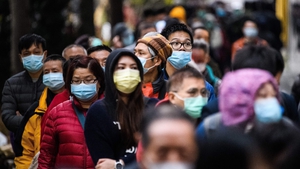 People in Hong Kong wear face masks as a protective measure