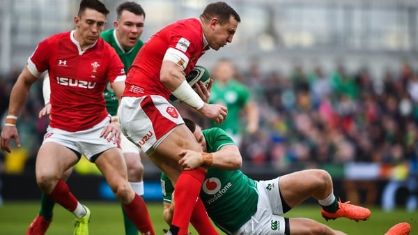 Hadleigh Parkes of Wales is tackled by Andrew Conway of Ireland