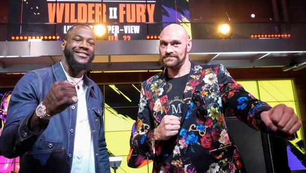 Deontay Wilder (L) and Tyson Fury (R) face-off during a press conference in Los Angeles