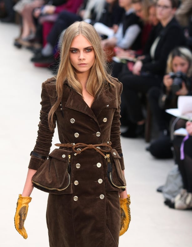 Cara Delevingne on the catwalk during the Burberry Prosum catwalk show in February 2012 (Gareth Fuller/PA)