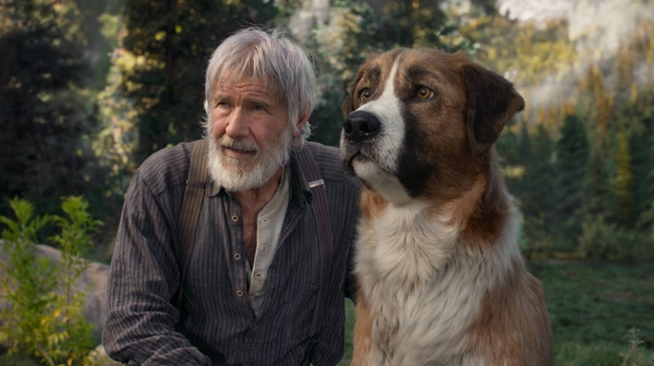 Harrison Ford as John Thornton and his beloved dog Buck in The Call of the Wild