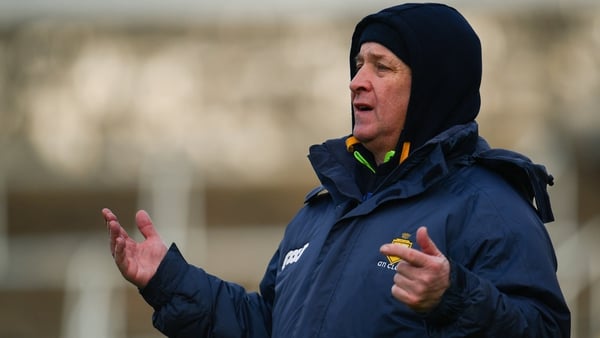 Colm Collins steers his Clare side to their first ever win in Newbridge
