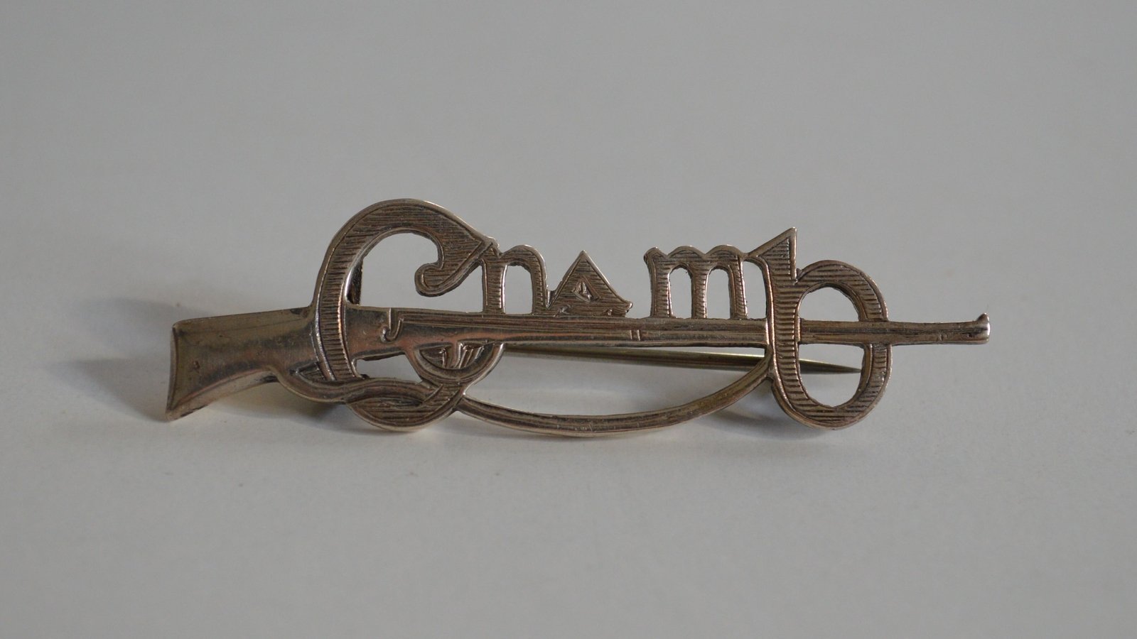 Image - A Cumann na mBan pin. Image courtesy of Kilmainham Gaol Museum, KMGLM 2011.0344