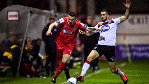 Aidan Friel of Shelbourne in action against Michael Duffy of Dundalk