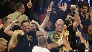 Andy Lee (l) and Tyson Fury (r) after the victory over Wilder