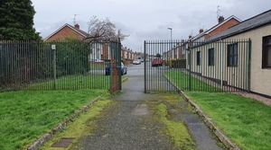 The 2.4m-high steel railing fence and gates were erected at Margretta Park in Lurgan in 1999