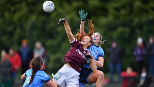 Siobhán Divilly of Galway rises up between Dublin's Jennifer Dunne (R) Leah Caffrey at Parnell Park.