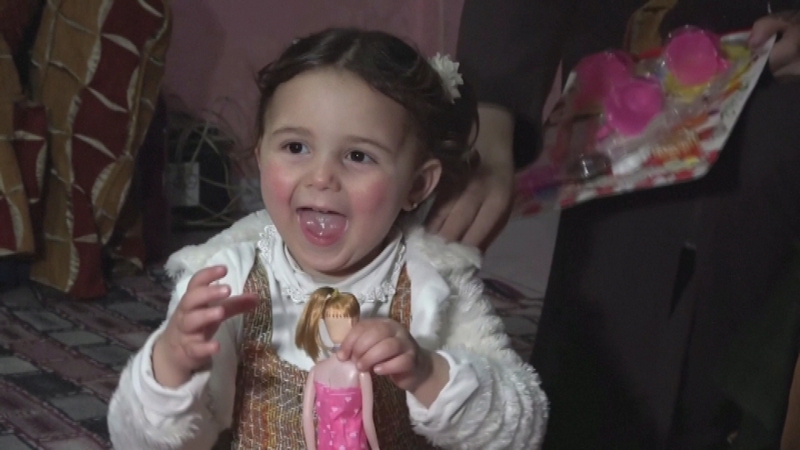 Laughing Syrian girl begins new life in Turkey