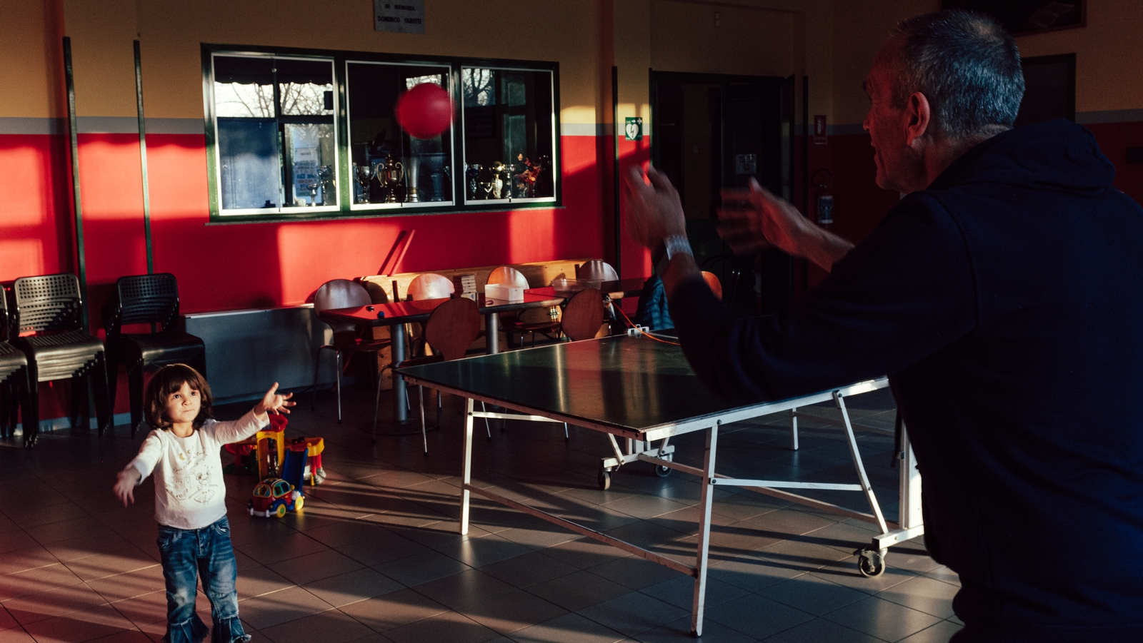 Image - Keeping busy indoors: Marzio's family entertain themselves (Image: Marzio Toniolo)