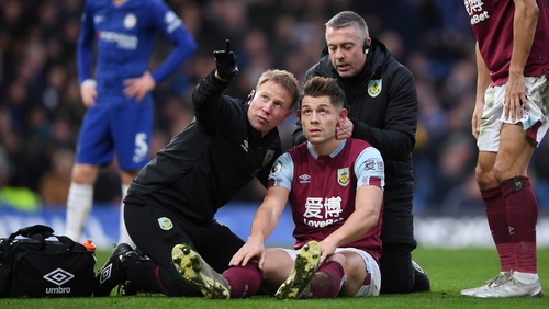James Tarkowski of Burnley is assessed for concussion during a match between against Chelsea at Stamford Bridge in January.