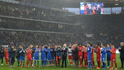 Bayern crush Hoffenheim as game interrupted over banner