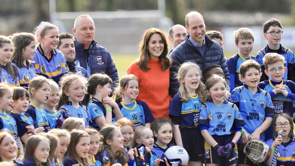 The royal couple pose for pictures with children from Salthill Knocknacarra GAA Club in Galway (Pic:Julien Behal Photography)