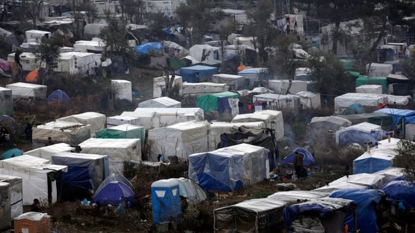 Thousands of people are living in makeshift accommodation at camps on either side of the frontier
