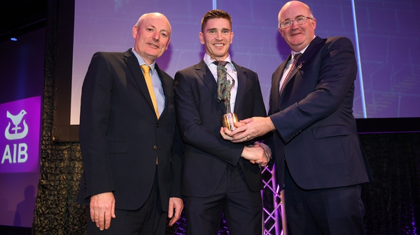 Brendan Maher (c) receiving his award