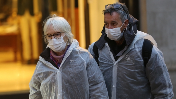 Londoners wearing masks
