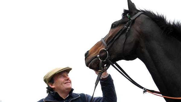 Trainer Nicky Henderson poses for a photo with Altior