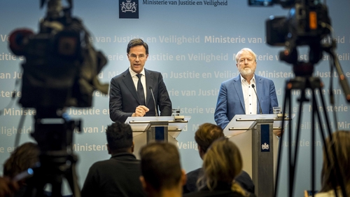 Dutch Prime Minister Mark Rutte (L) and Director of the National Institute for Public Health and the Environment Centre for Infectious Disease Control, Jaap van Dissel