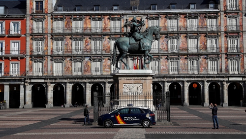 An empty square in Madrid as Spain ramps up measures to curb the spread of Covid-19