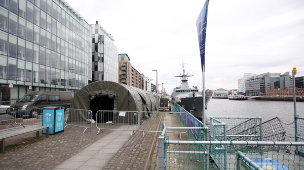 Members of the Defence Forces setting up a test centre at the LÉ Samuel Beckett on Sir John Rogerson's Quay in Dublin