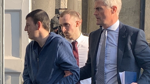 Trevor Rowe (left) accompanied by detectives at Kilkenny District Court in 2020