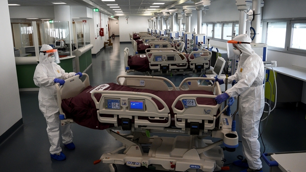 Nurses work to prepare the Intensive care unit in a new Covid-19 Hospital in Verduno, near Alba, Northwestern Italy