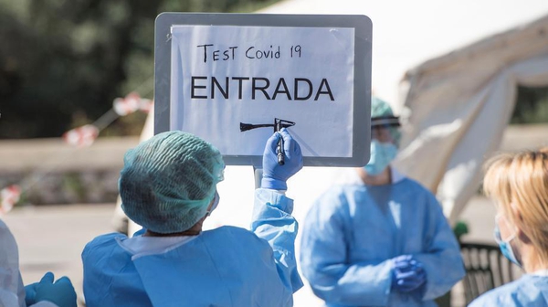 A sign to inform patients about the entrance to a Covid-19 testing centre in Canal Salat, Menorca