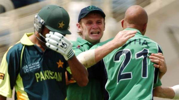 Andre Botha, Ireland, celebrates with William Porterfield after taking the wicket of the distraught Imran Nazir