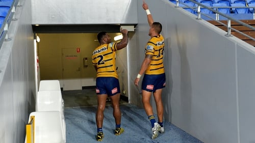 Maika Sivo and Kane Evans of the Eels leave the field after final NRL match of season thus far against the Gold Coast Titans
