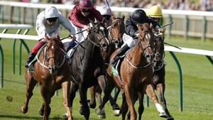Shane Foley riding Millisle (black) to victory in the Cheveley Park Shane Foley riding Millisle (black) to victory in the Cheveley Park