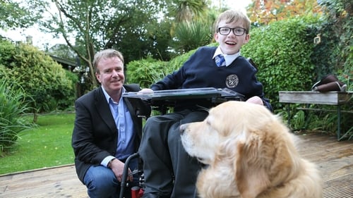 Tom Clonan with this son Eoghan and assistance dog Duke