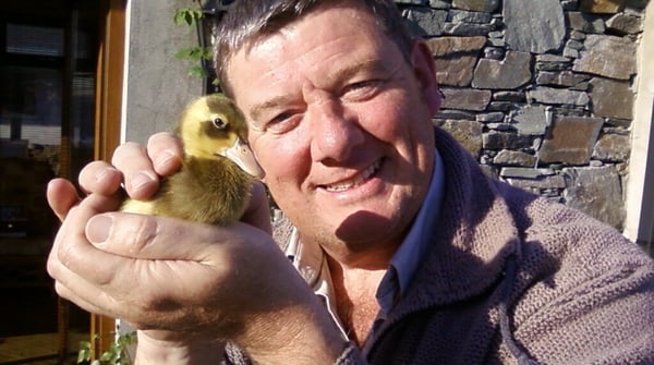 John with feathered friend in the back garden...